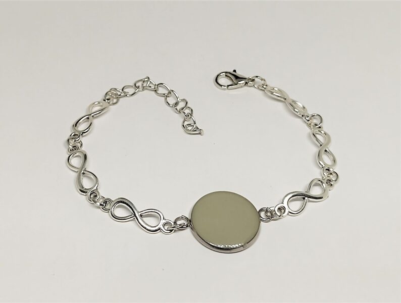 Bezgalības zīmju rokassprādze ar spīdošo elementu