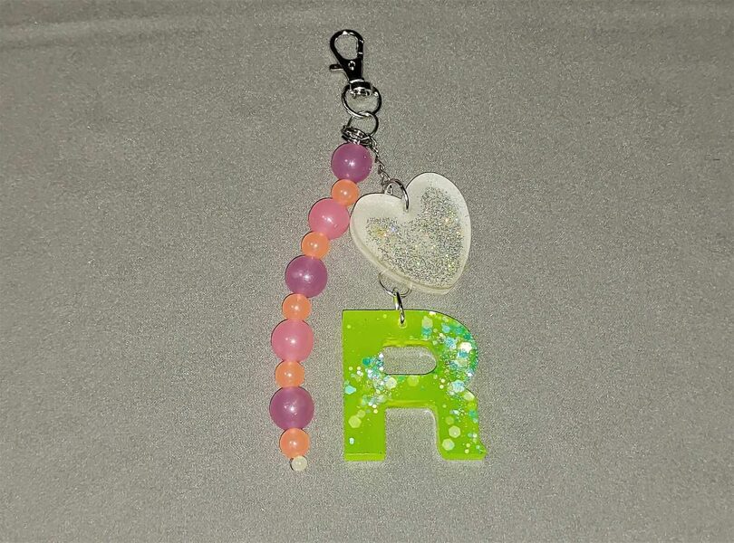 Piekariņš R ar rozā virteni