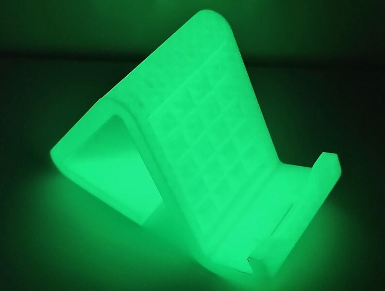 Zaļš telefona statīvs